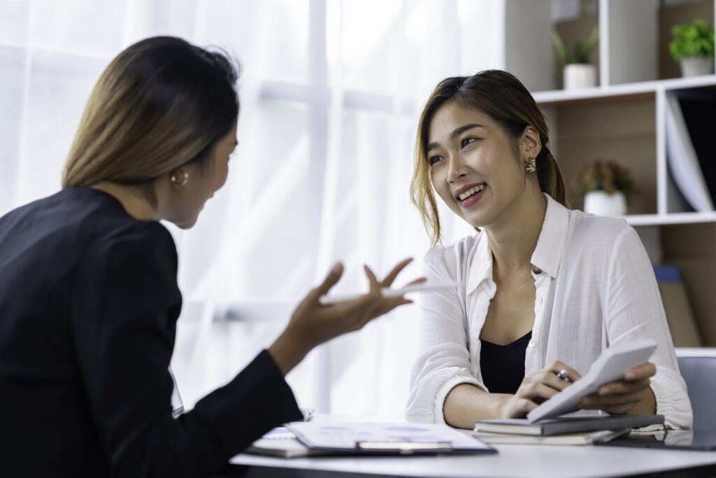 A customer retention strategist talking to a client